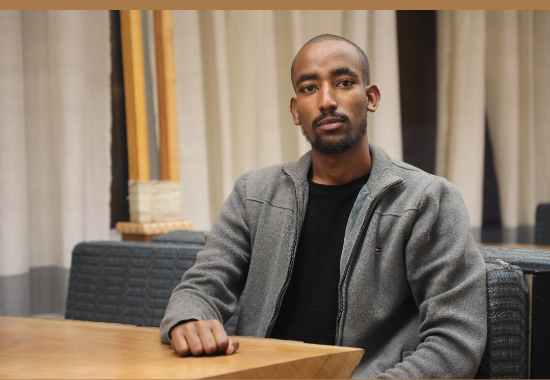 Portrait of Yitbarek Denbuyirga, senior creative designer and photographer